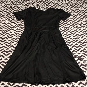 Women’s black dress with side pockets